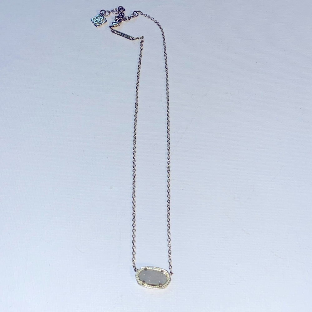 Kendra Scott Elisa Gold pendant necklace with iridescent white stone!